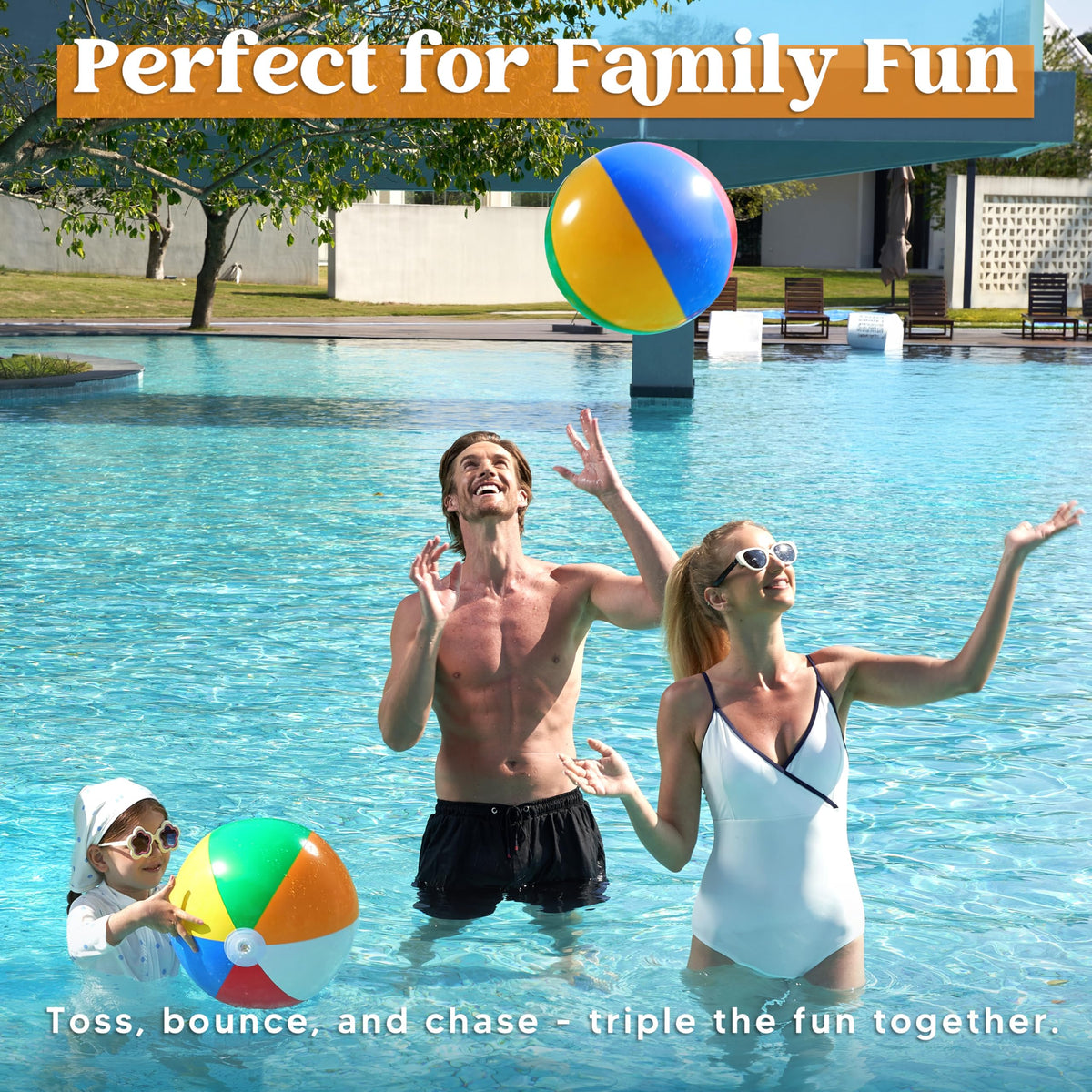 Vibrant rainbow color inflatable balls used as Hawaiian luau birthday party decorations.