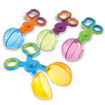 Children using Learning Resources Handy Scoopers for sensory bin play