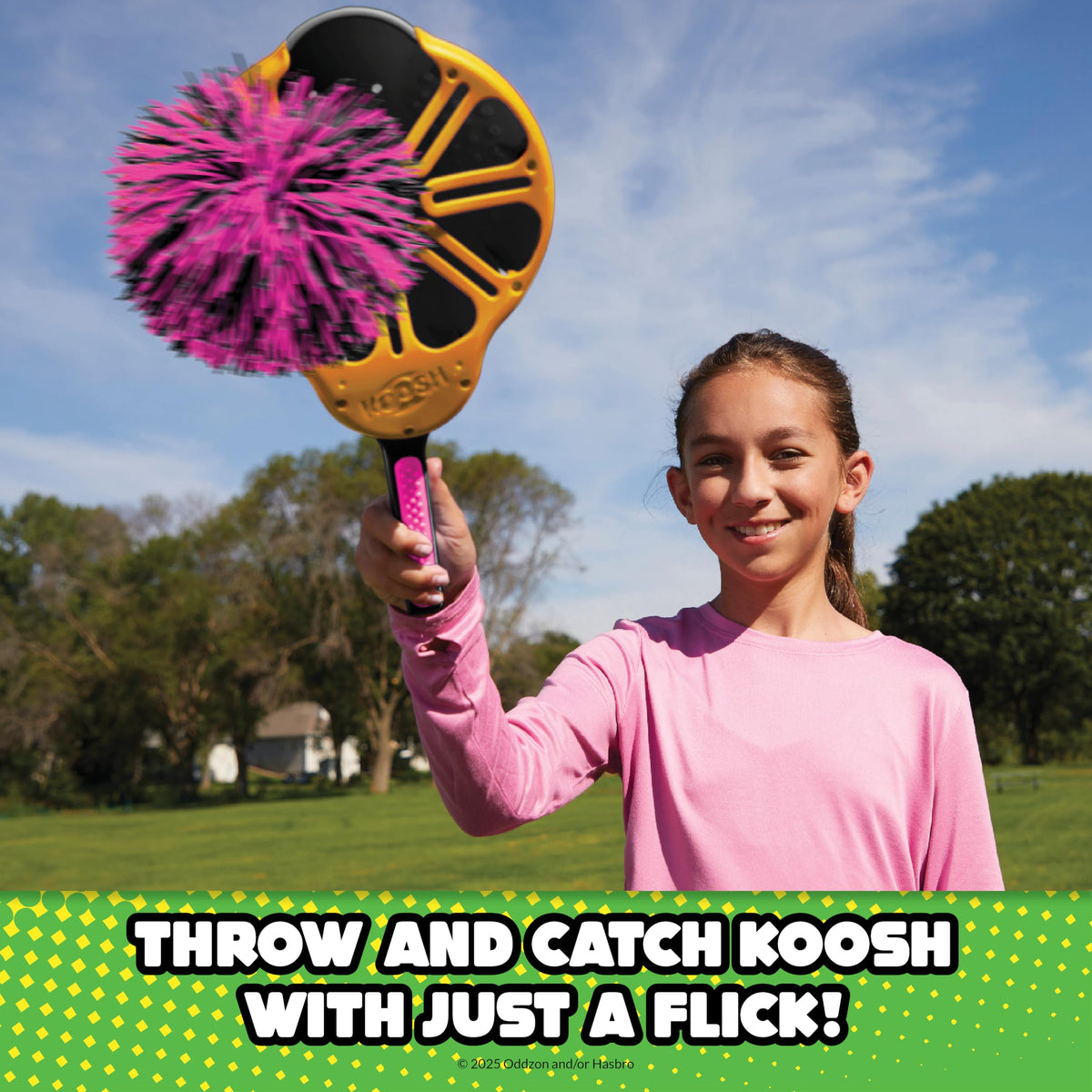 Family playing catch with Koosh Flix Stix outdoors
