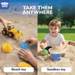 Child playing with dinosaur fossil molds in sand
