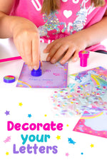 Original Stationery unicorn theme ruled paper sheets and matching envelopes side-by-side.
