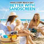 Family using Shakalo sand removal product at the beach