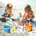 Detailed view of collapsible silicone buckets for sandbox play