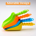 Set of four vibrant blue and green sand shovels