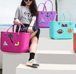 Variety of decorative Lckaey rubber charms for beach totes