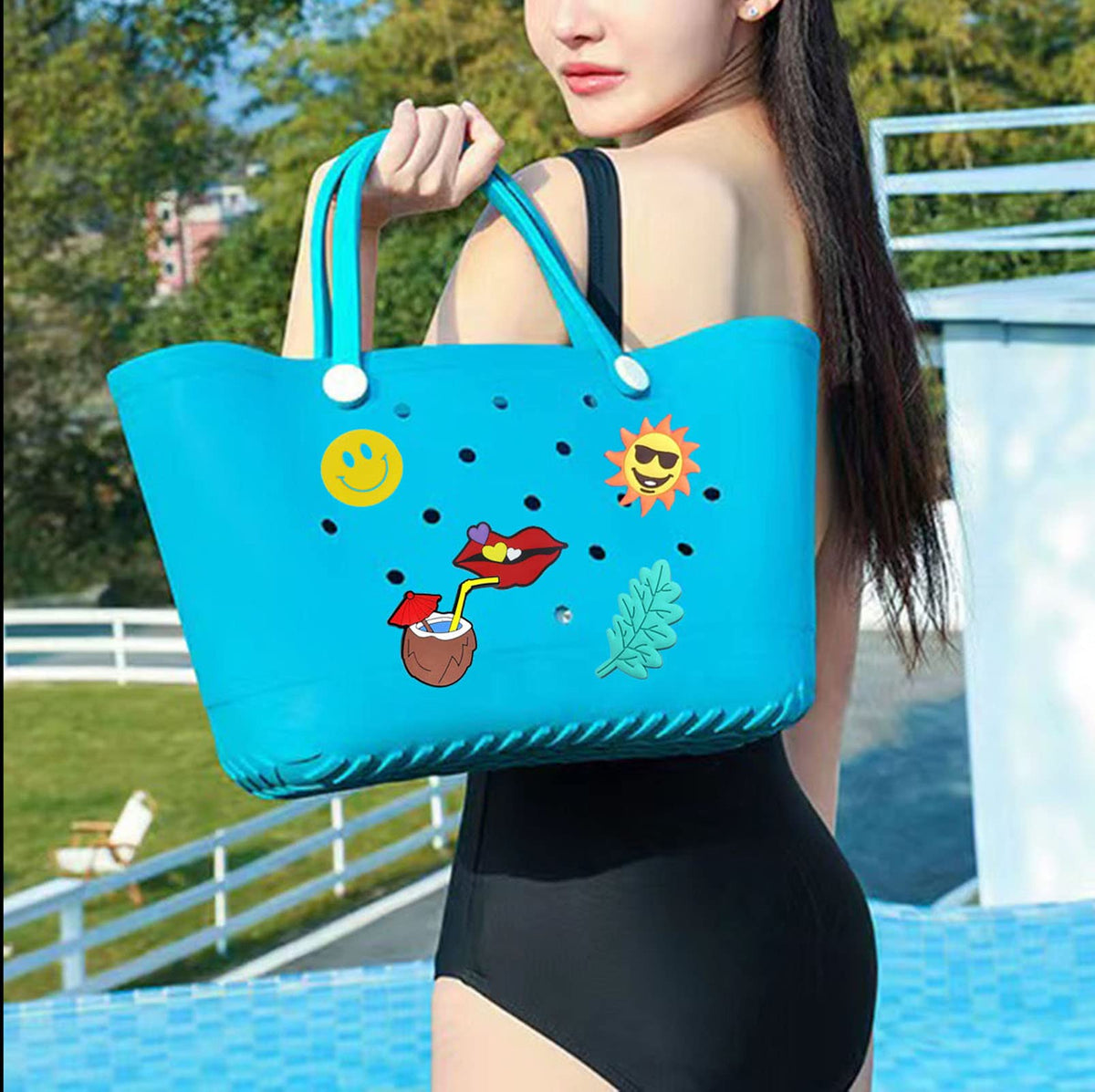 Lckaey rubber accessories fitted on a rubber tote bag