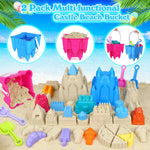 Close up of castle sand molds and plastic rakes for kids.