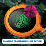 Family enjoying indoor activity with Koosh paddle game