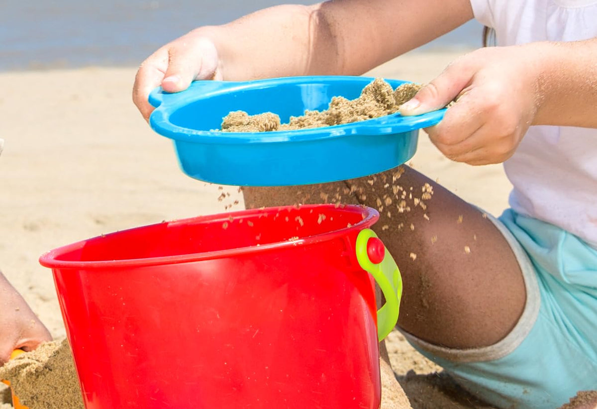 Brightly colored Hape sand toy set for outdoor activity