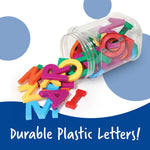 Close up of oversized uppercase magnetic letters on a whiteboard