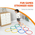 Children playing with colorful hopscotch rings outside