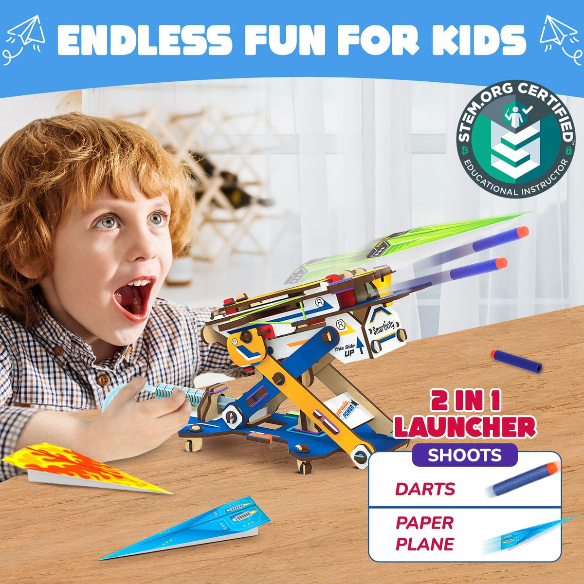 Side angle of the Smartivity hydraulic science toy showing water syringes and connected tubes