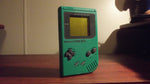 Vintage Nintendo Game Boy green handheld retro gaming