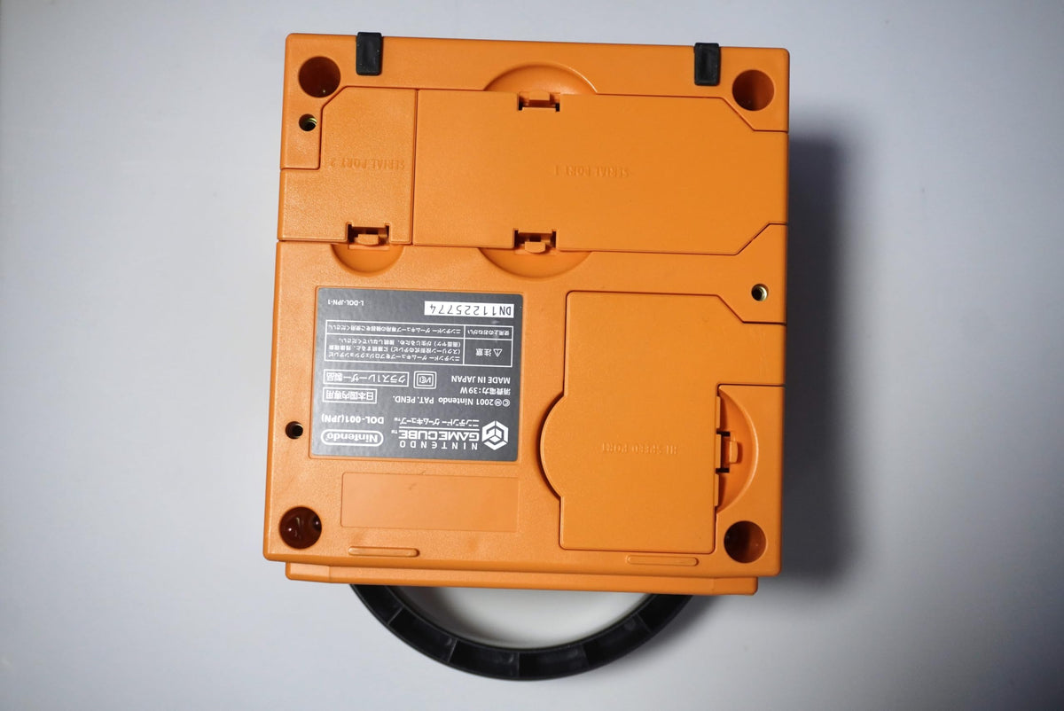 Close up of Nintendo Gamecube logo on Spice Orange unit