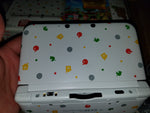 Nintendo 3DS XL console with pre-installed Animal Crossing game screen
