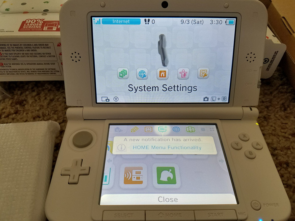 Nintendo 3DS XL bundle with included charger and accessories