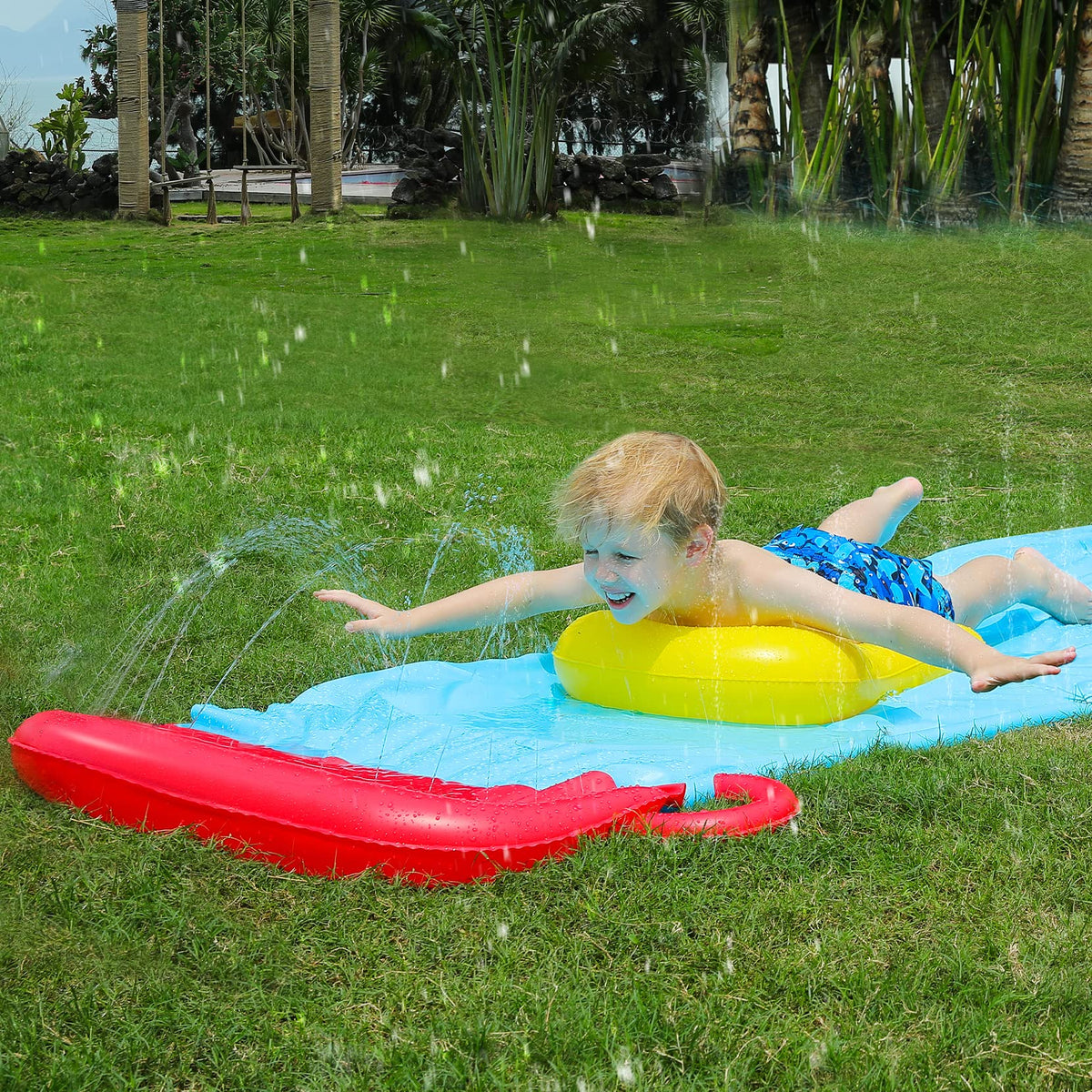Child using the included bodyboard on the Elemara inflatable slide