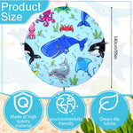 Tondiamo toddler pool blanket laid out flat as a sandproof picnic mat on the beach.