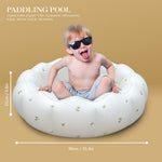 AirSwim portable paddling tub set up outdoors on a lush green garden lawn