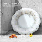 AirSwim compact white kiddie pool stored neatly on a shelf when deflated