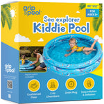 A toddler safely playing inside the cushioned GRIP A POOL with backyard summer water toys.
