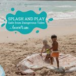 Beach Puddle 2-in-1 Kiddie Pool and Blanket spread out flat as a family beach mat.