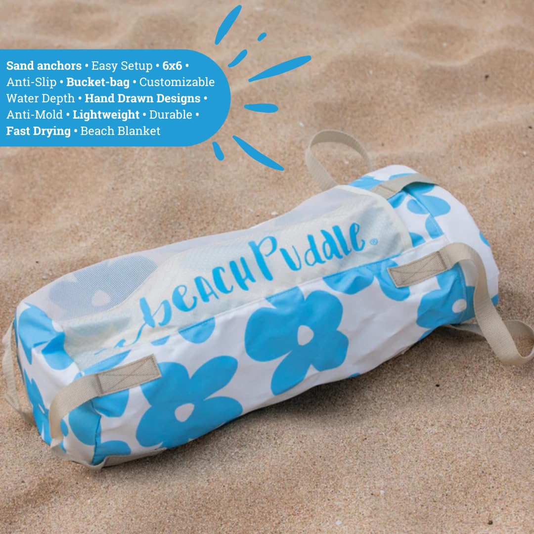 Using the Beach Puddle travel storage bag as a bucket to pour water.