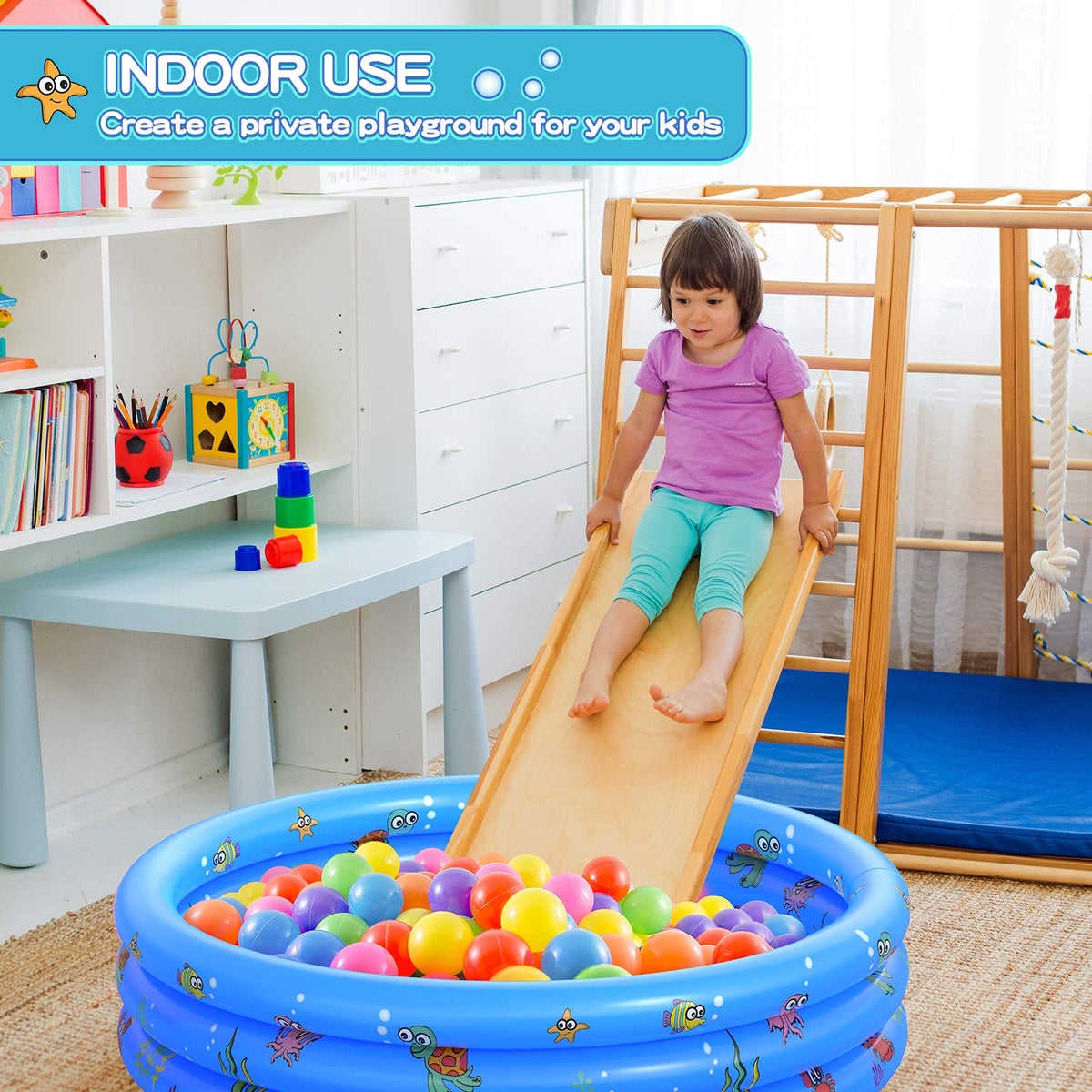 VIVI MAO blue three ring inflatable pool used indoors as a colorful toy ball pit