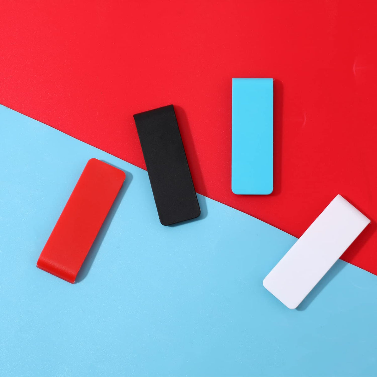 Four colors of Kinbom replacement stands for Nintendo Switch