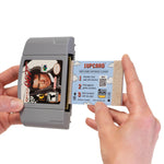 1UPcard being inserted into a vintage game cartridge for cleaning