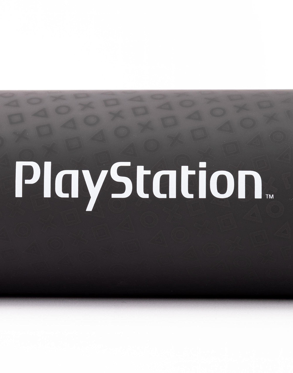 Detailed view of PlayStation console symbol on water bottle