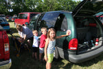Toddler hand on Parking Pal car safety magnet