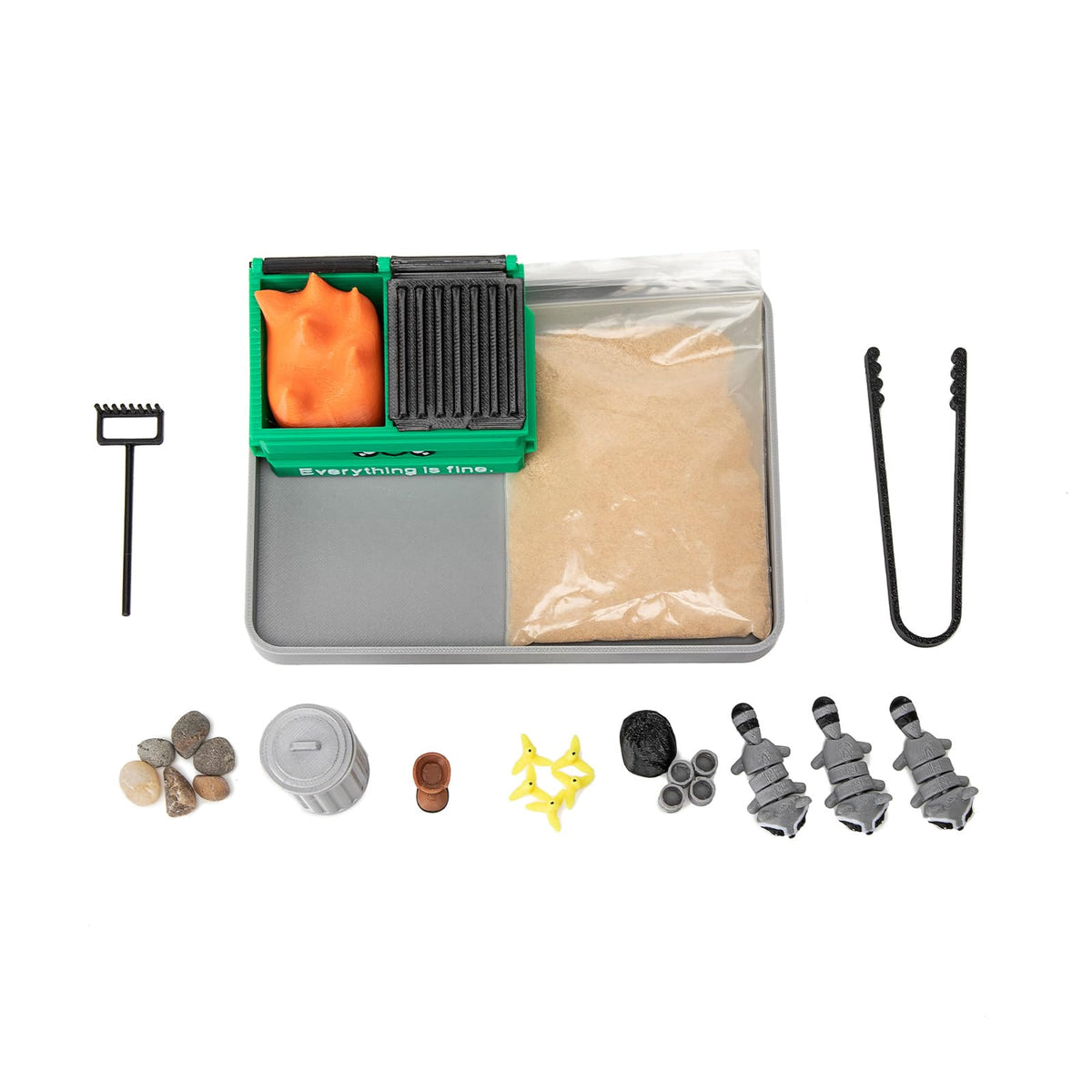 Stylor mini sandbox showing sand and wooden rake tool