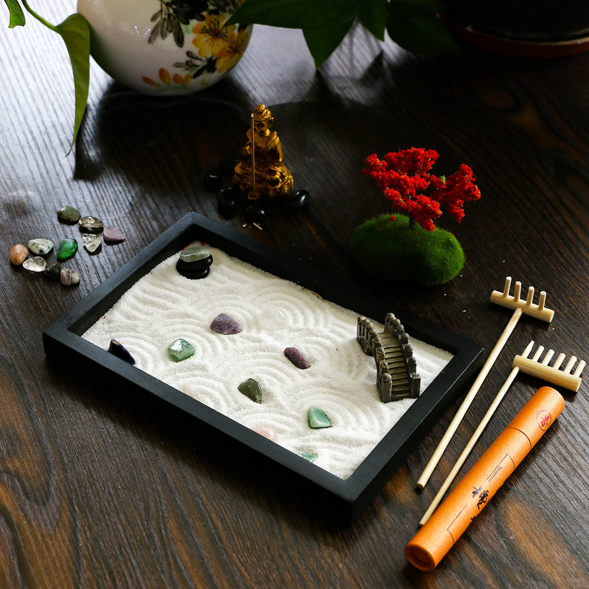 Close up of BangBangda Zen garden Buddha incense holder and stones