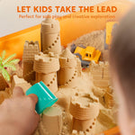 Close up of magic sand molds and building kit