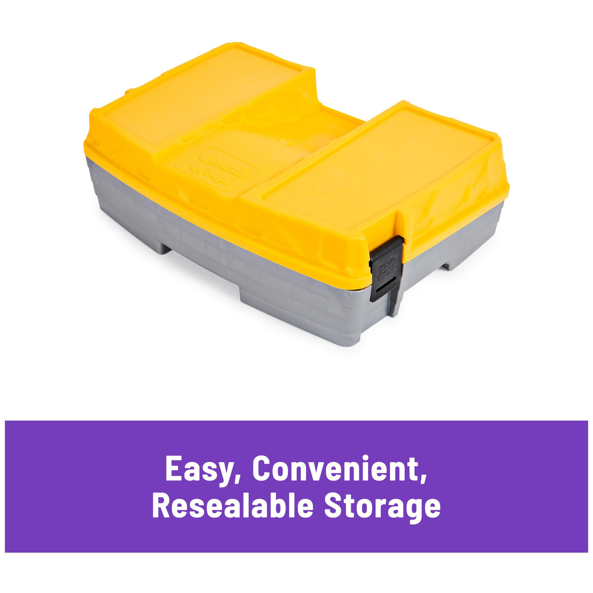 Top view of the yellow storage case containing Kinetic Sand accessories.
