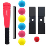 Toddler playing with soft foam baseball bat and tee stand
