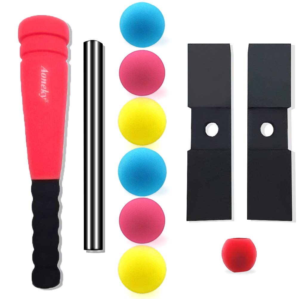Toddler playing with soft foam baseball bat and tee stand