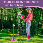 Child practicing baseball stance with tee