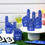 Hand wearing a mini foam finger prop