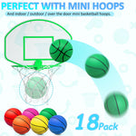 Kids playing with colorful Oleitodh mini basketballs outdoors