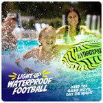 HydroSport glowing water football illuminating in a swimming pool at night