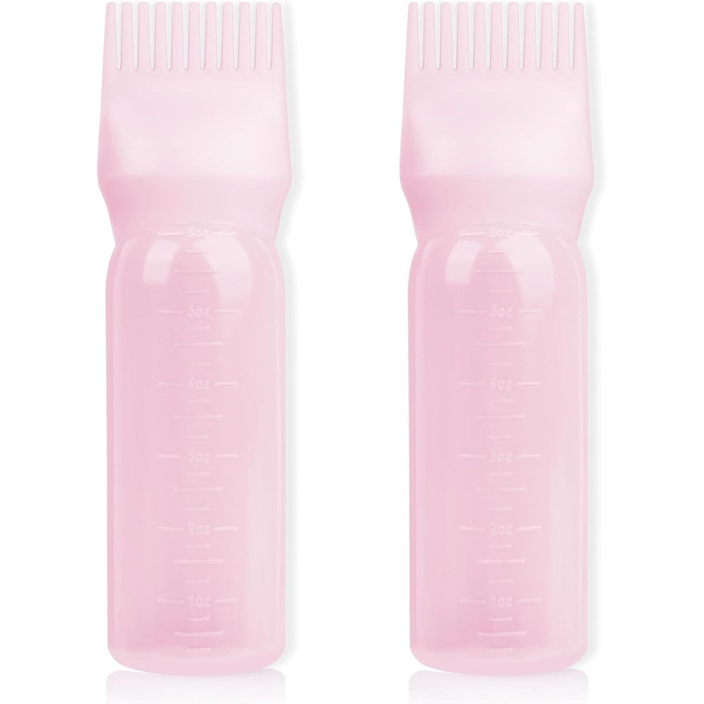 BLAAROOM root comb applicator bottle front view showing pink plastic squeeze body and comb cap design.