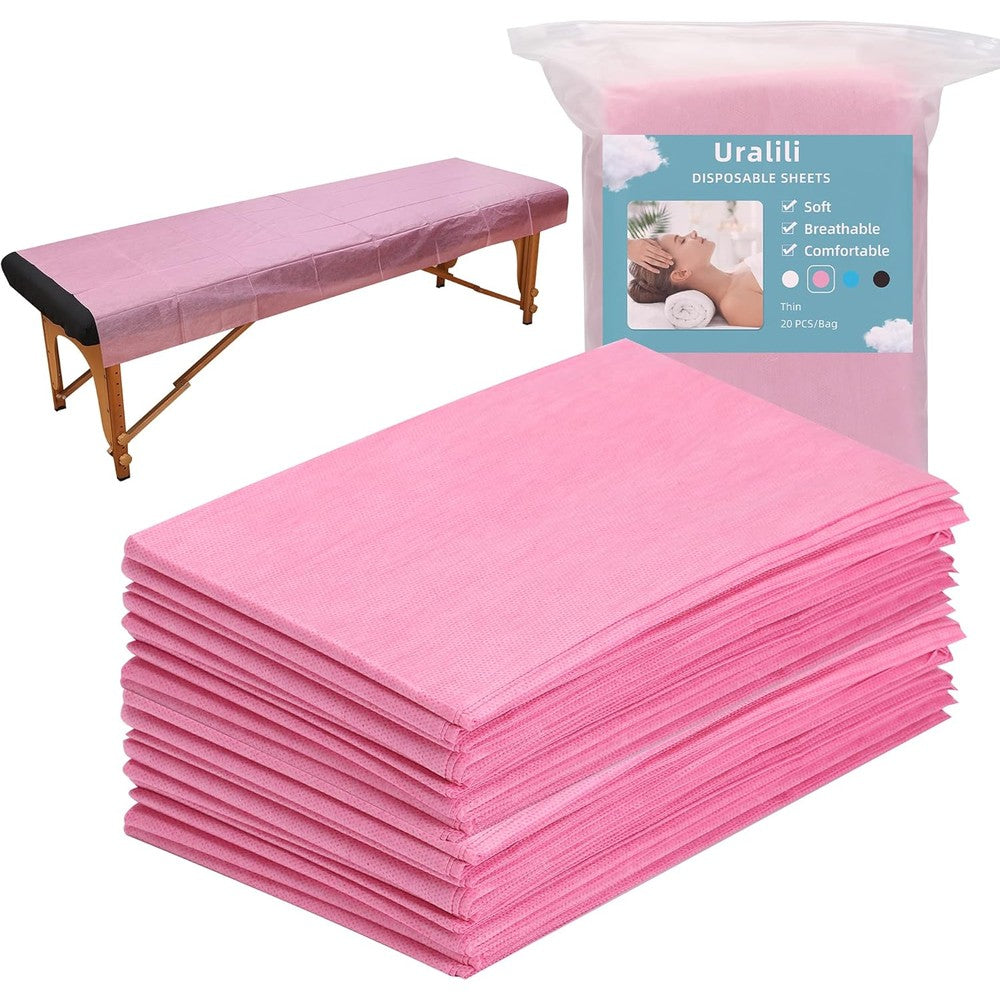 Uralili disposable massage table sheets front view pack of twenty pink spa bed covers.
