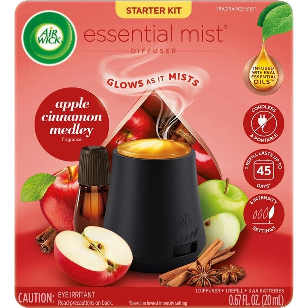 Air Wick Essential Mist Starter Kit front view showing black diffuser and apple cinnamon refill.