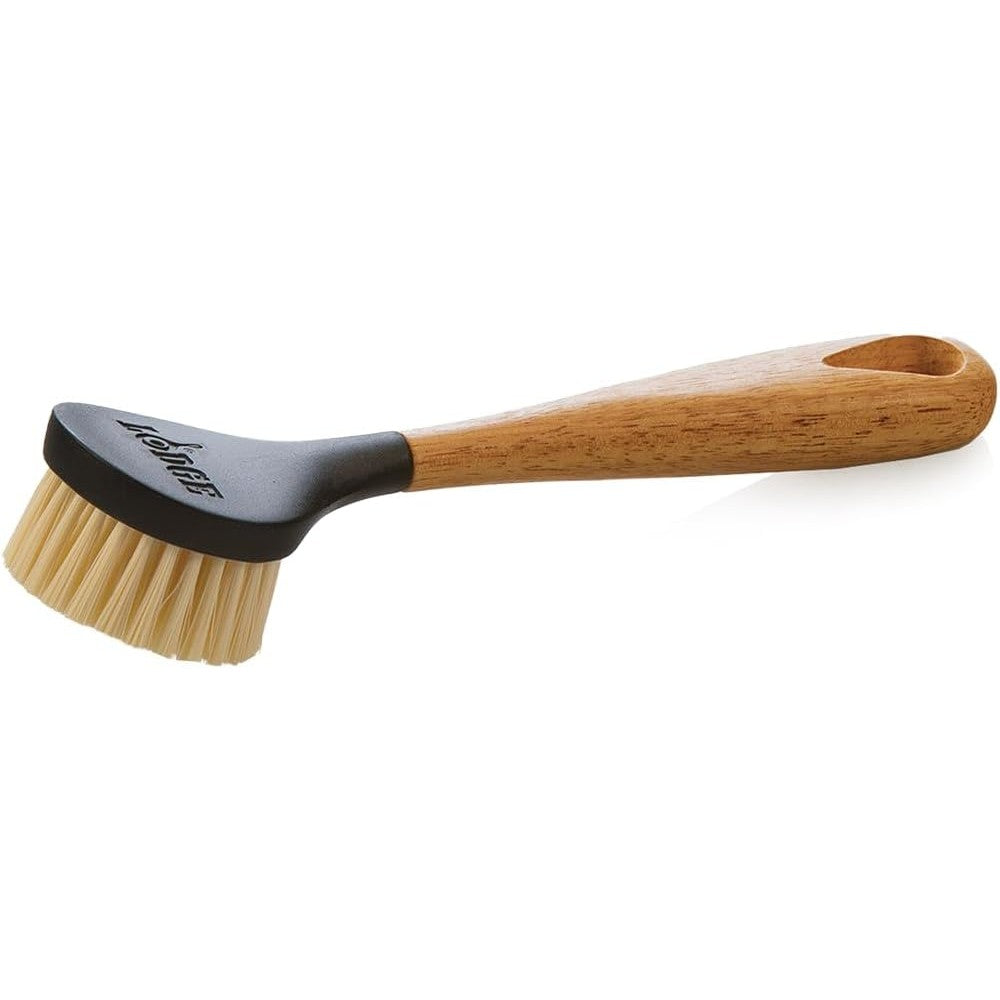 Lodge Care Scrub Brush front view with wood handle for cast iron cleaning.