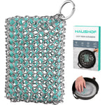 HAUSHOF cast iron chainmail scrubber front view featuring seafoam green silicone core