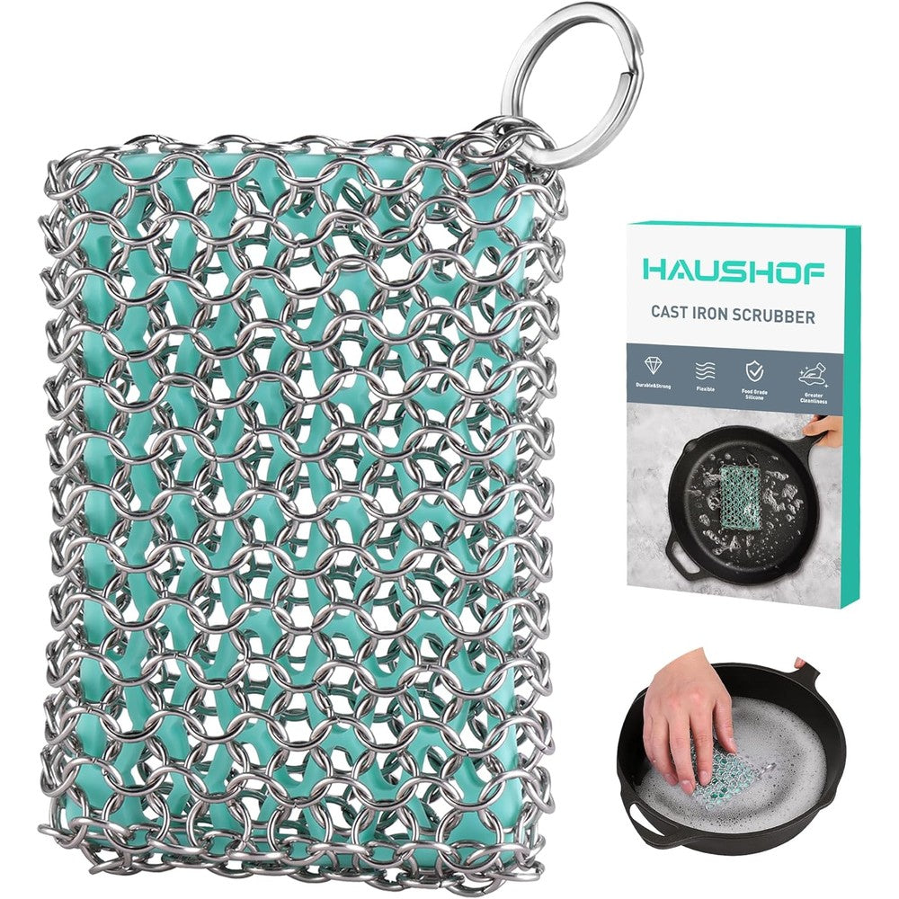 HAUSHOF cast iron chainmail scrubber front view featuring seafoam green silicone core