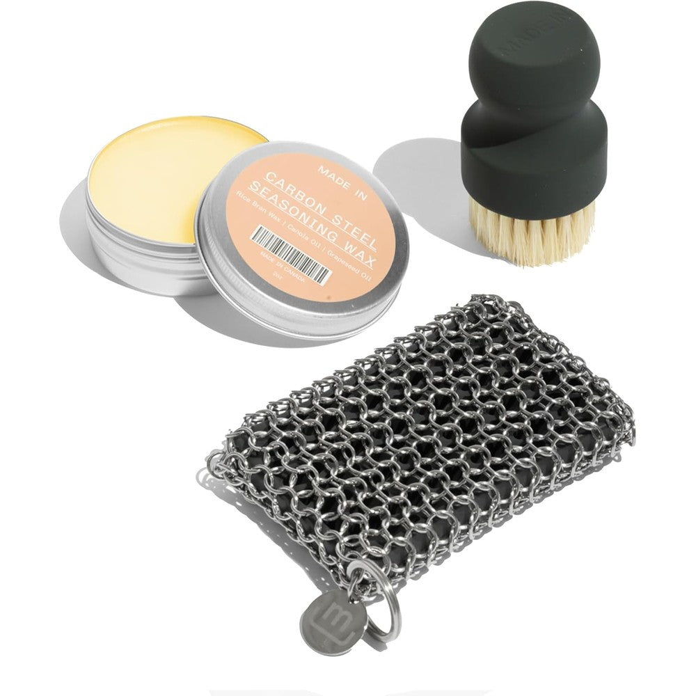 Made In Cookware Three Piece Carbon Steel Cleaning Set showcasing the complete premium kitchenware maintenance kit packaging front view