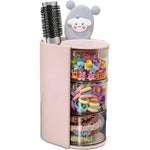Azurphoric hair accessories organizer front view showing three clear pink layers filled with hair clips and a side hairbrush holder